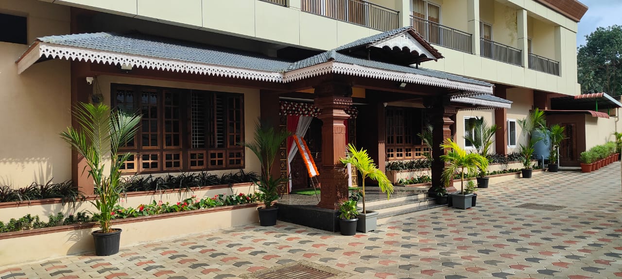 Side view of Hotel Parijatha Inn property near Nethravathi Bridge, Dharmasthala